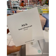 O Abib Green LHA Pore Pad serve para esfoliar suavemente a pele, desobstruir e minimizar os poros, controlar a oleosidade e prev